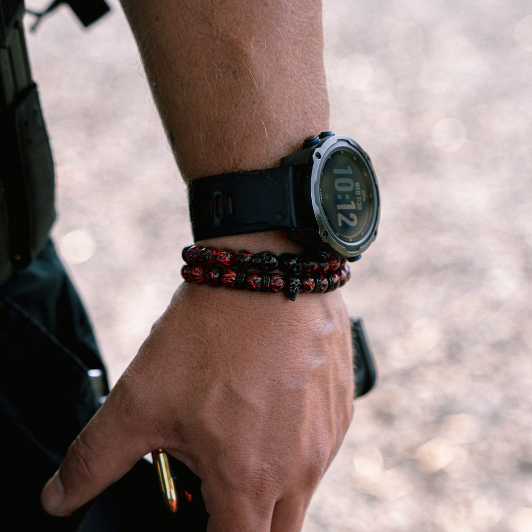 GBRS Group x SkeletonHD War Crimes Beaded Bracelet Set - pictured in on a wrist with a watch - lifestyle shot