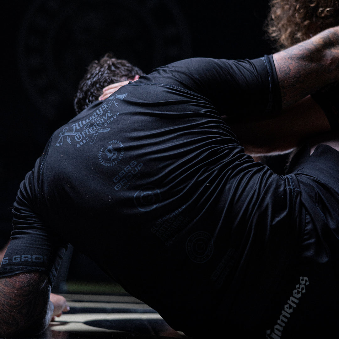 GBRS Group Axes Short Sleeve Rash Guard - lifestyle action shot