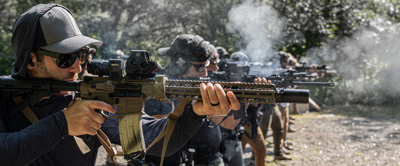 Firearms Training Courses for 2026 are now available. Picture of men participating in a class