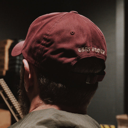 GBRS Group Dials Not Switches Dad Hat in Maroon - Back with buckle style adjustment - Lifestyle Shot