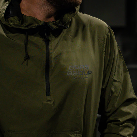 GBRS Group Instructor Windbreaker Jacket - Anniversary Edition. Half zip pull-over, water resistant, windbreaker jacket. - Close up of the front chest print