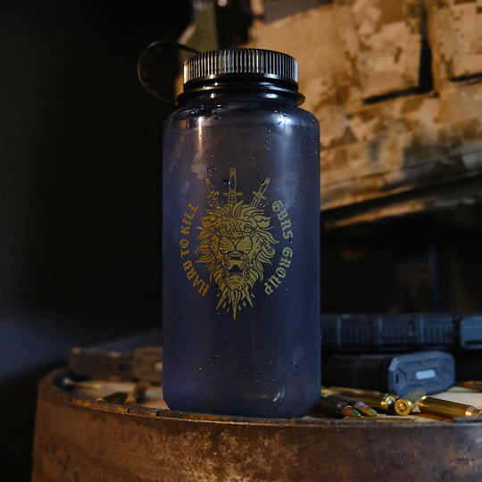 GBRS Group Hard To Kill Nalgene Water Bottle - Lifestyle image on table