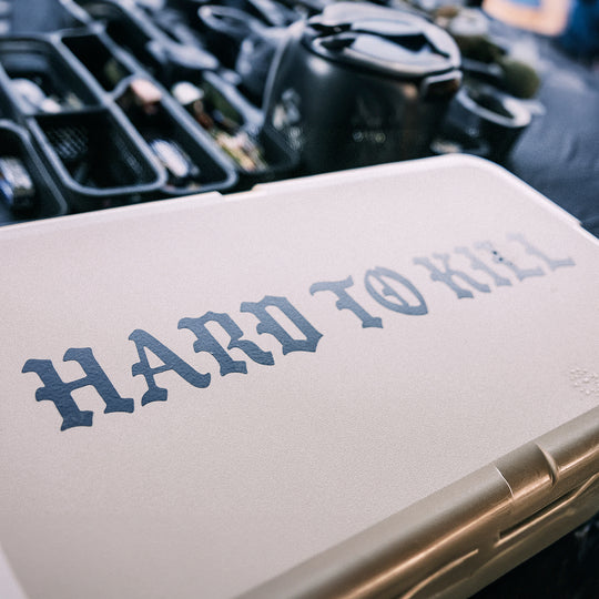 GBRS Group Hard To Kill Transfer Sticker on top of a large cooler. - Lifestyle shot.