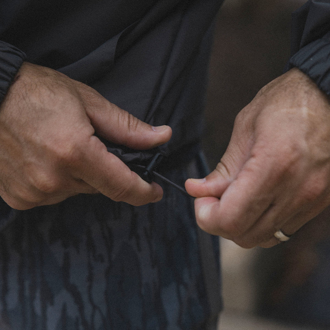 GBRS Group Terrible Night Rain Jacket - lifestyle shot picturing adjustable toggle detail