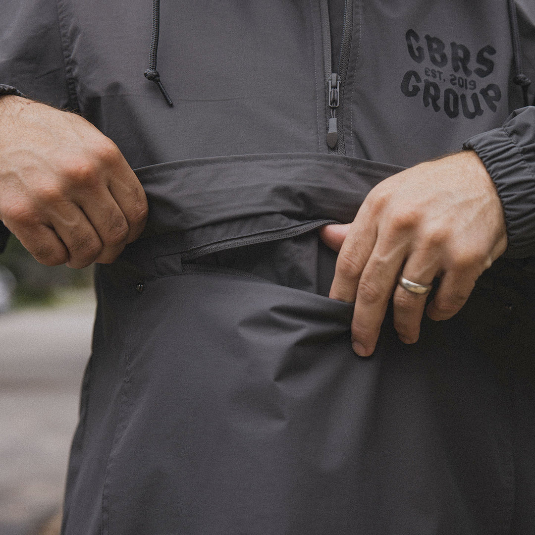 GBRS Group Terrible Night Rain Jacket - lifestyle shot picturing front pocket detail