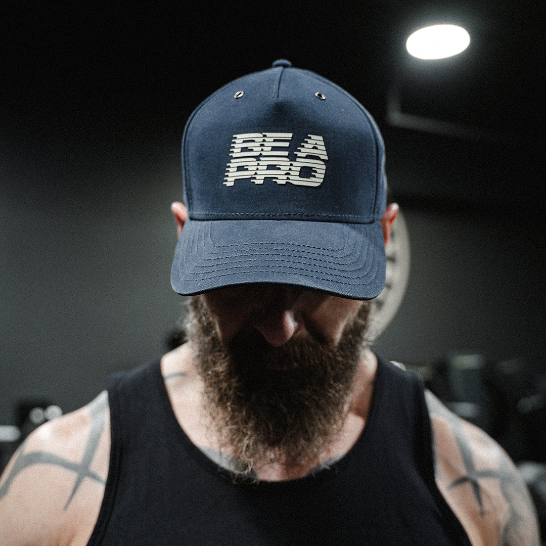 GBRS Group Be A Pro Canvas Trucker Hat - Lifestyle image picturing front of hat