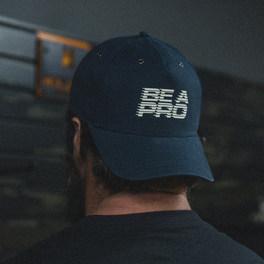 GBRS Group Be A Pro Canvas Trucker Hat - Lifestyle image picturing front of hat