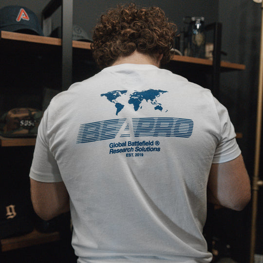 GBRS Group Intl Be A Pro Short Sleeve Shirt pictured in lifestyle shot showing the white shirt back screenprint design
