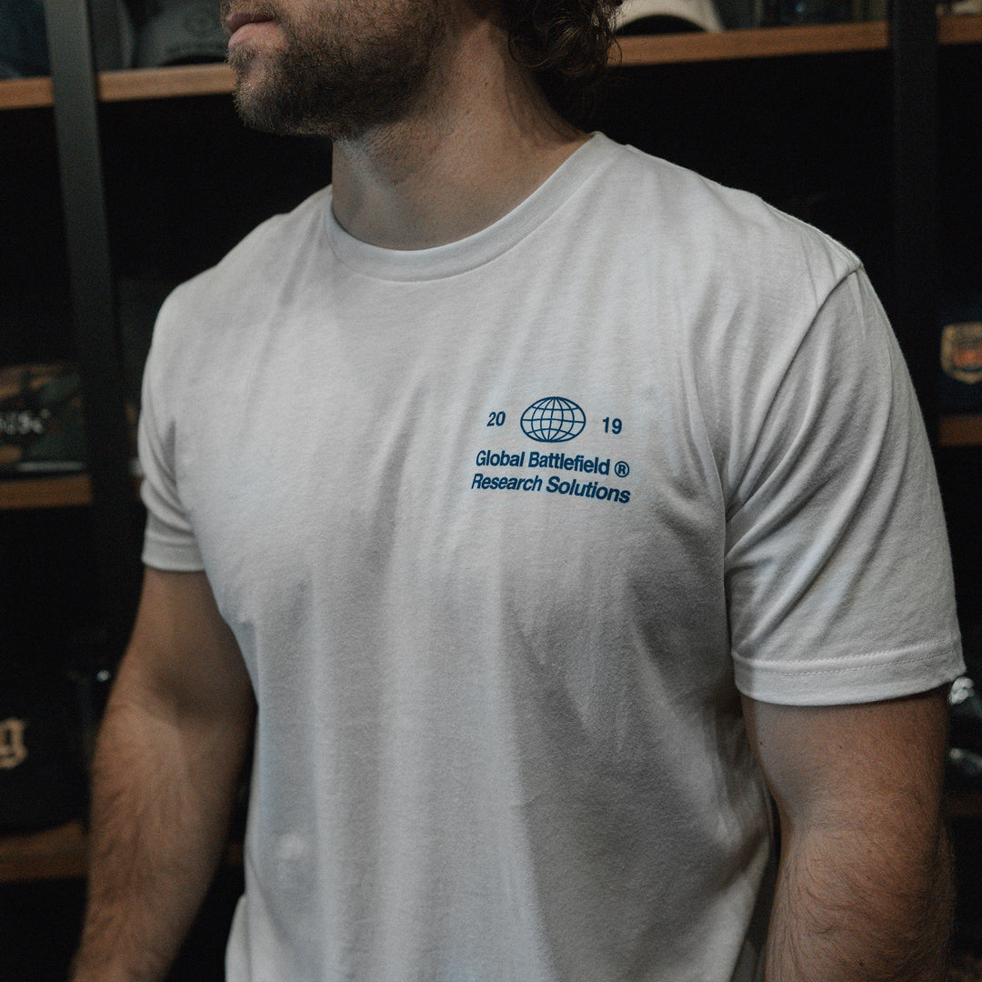 GBRS Group Intl Be A Pro Short Sleeve Shirt pictured in lifestyle shot showing the white shirt left front chest screenprint design