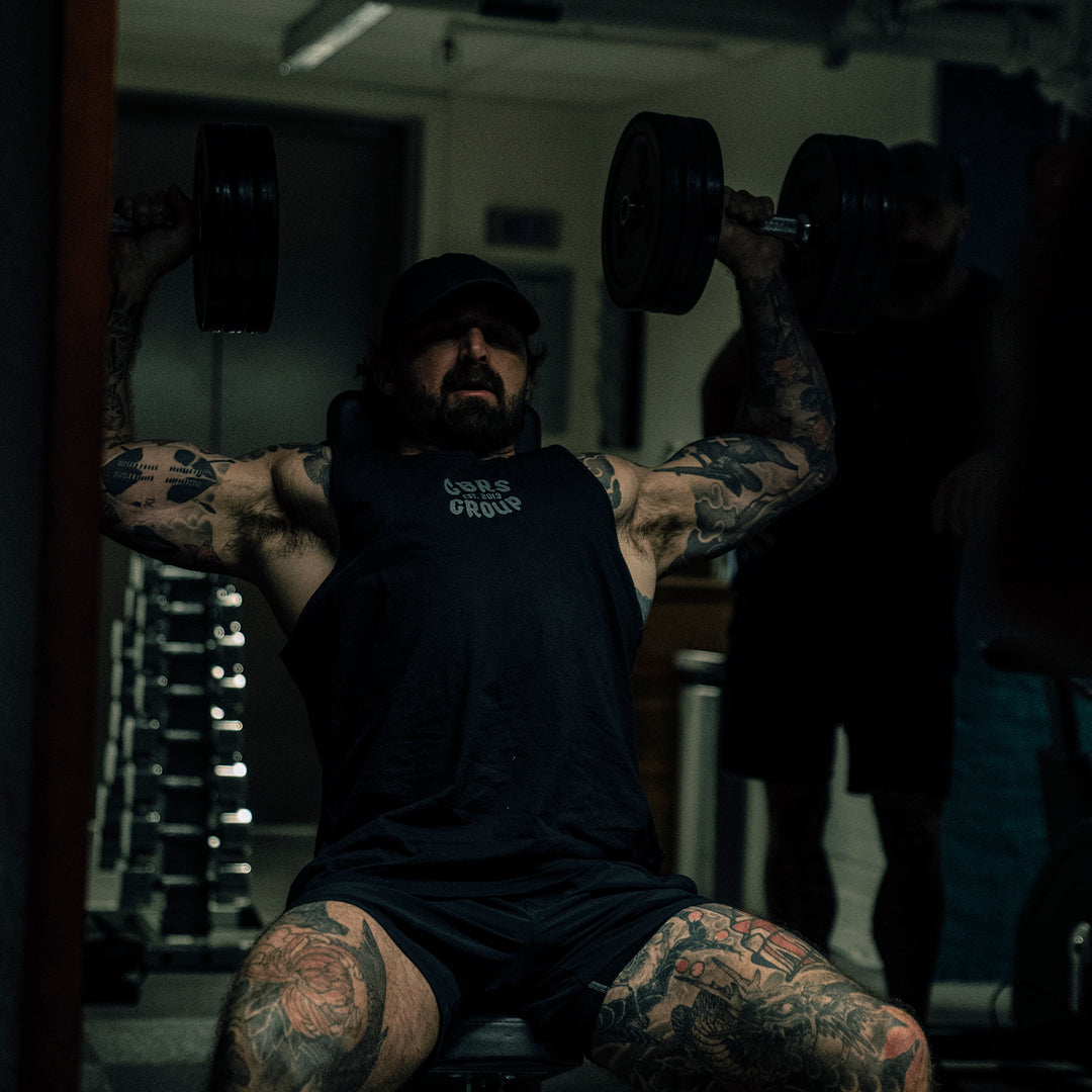 GBRS Group Black Flag Tank - Lifestyle shot picturing the front of tank in a gym