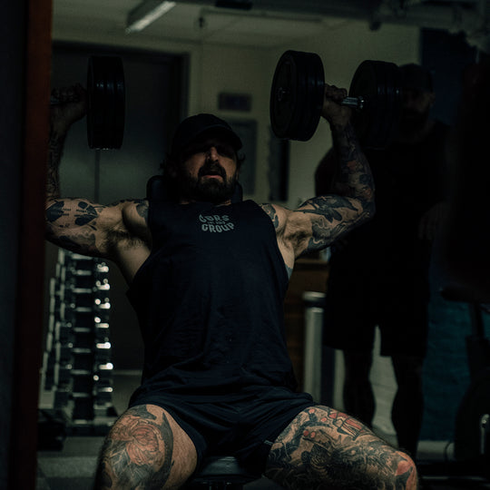 GBRS Group Black Flag Tank - Lifestyle shot picturing the front of tank in a gym