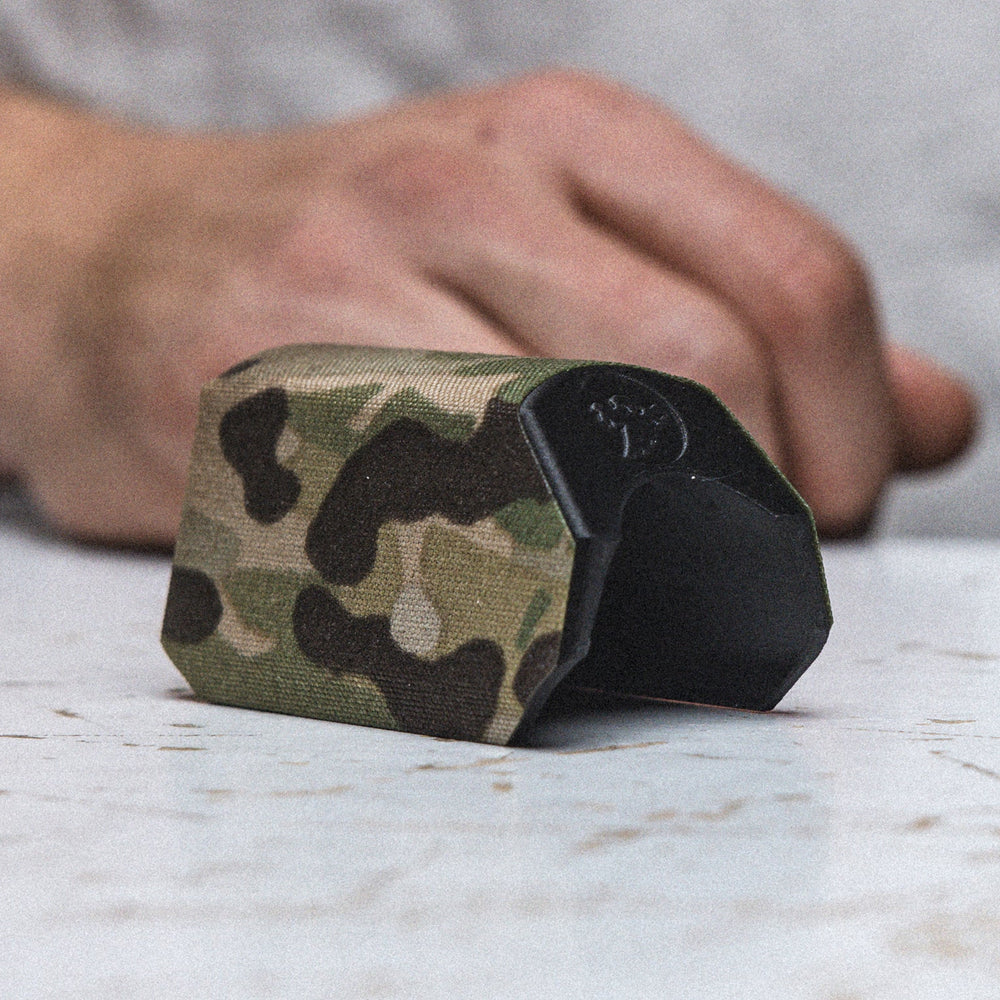 GBRS Group Cordura Cheek Riser Wrap - pictured on a table wrapped around a cheek riser