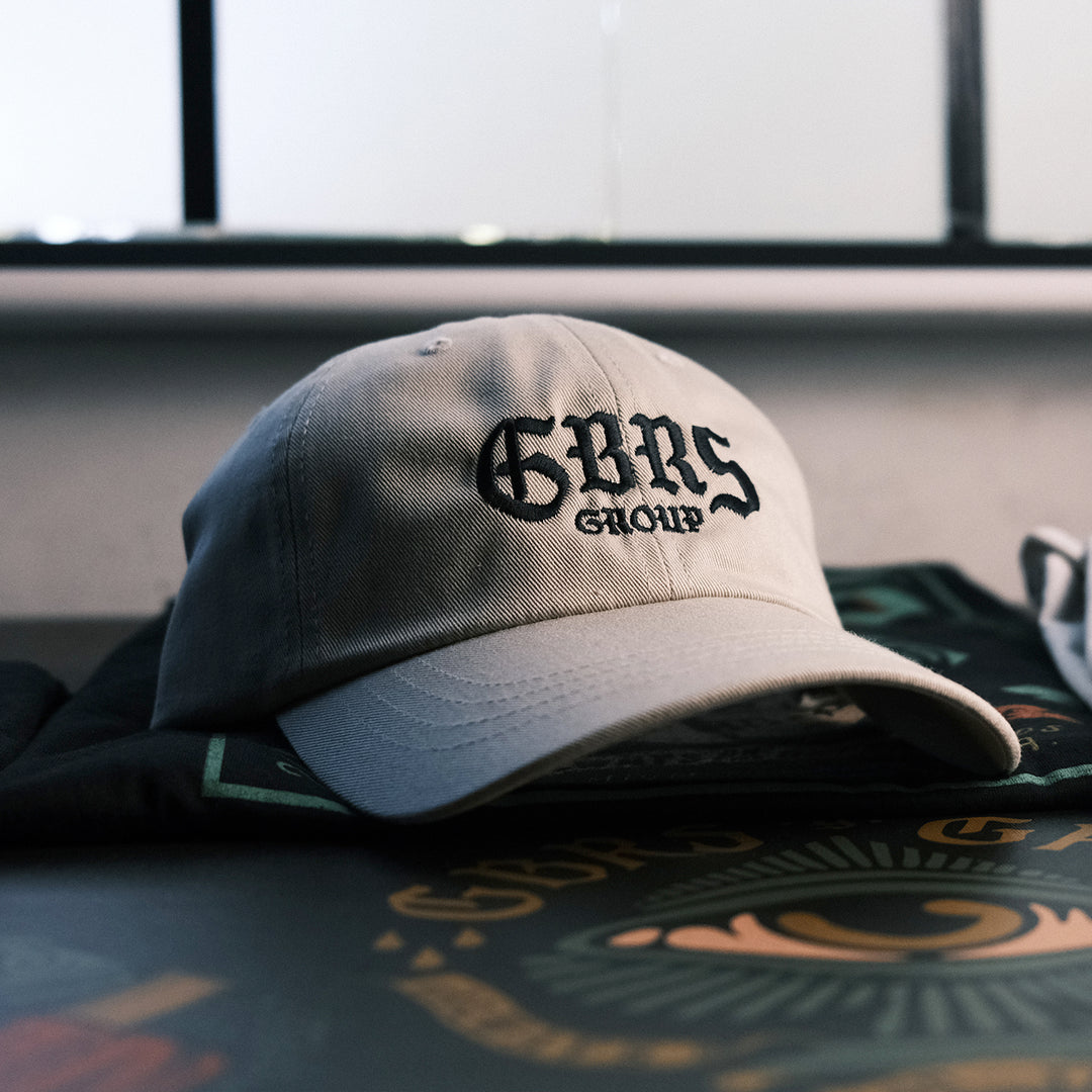 GBRS Group Always On The Offensive Dad Hat  - on table