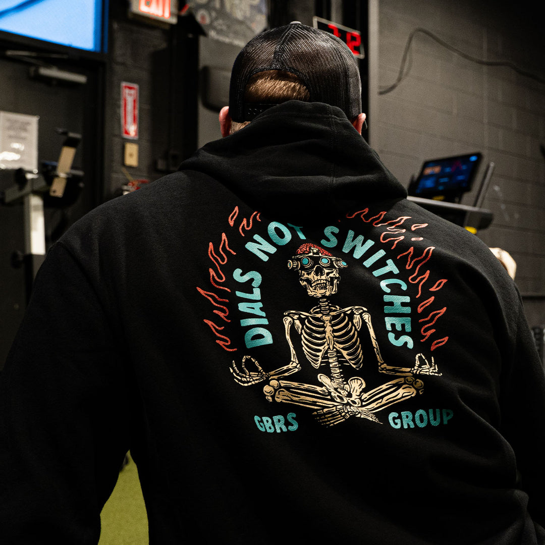 GBRS Group Lotus Pullover Hoodie Full Back Print Lifestyle Shot in a gym