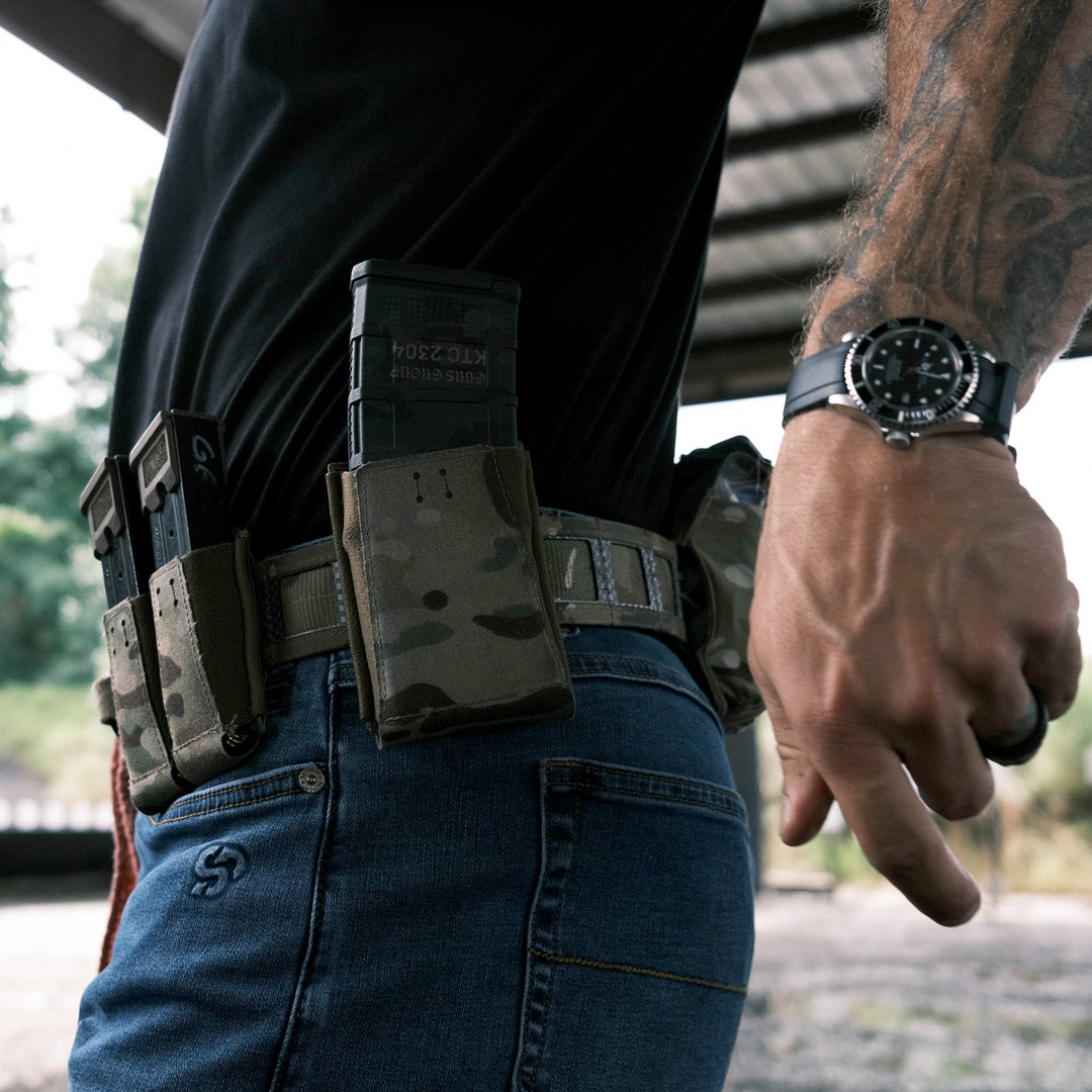 The GBRS Group Single Pistol Magazine Pouch is a versatile, collapsible magazine pouch. The squadron laminate and thick poly elastic material allow for a smooth draw, positive retention and easy reinsertion. MOLLE/BELT compatible pouch will fit most double-stacked pistol magazines.