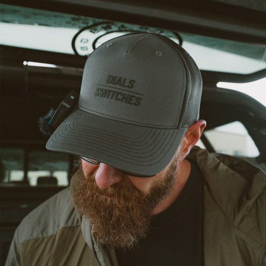 GBRS Group Dials Over Switches Trucker Hat - Front of hat lifestyle shot