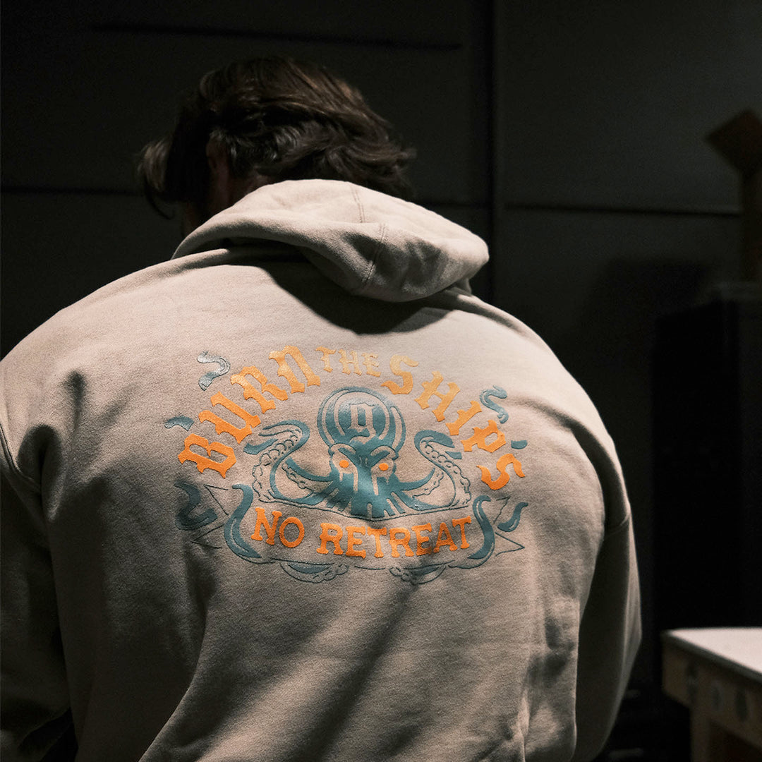 GBRS Group Kraken Pullover Hoodie is a Midweight pigment dye hooded pullover with a unique vintage feel. Screen printed Burn the Ships Kraken design backprint. Center chest Burn The Ships design.