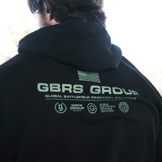 GBRS Group Instructor Pullover Hoodie - Anniversary Edition in Black with OD Green print.  - Lifestyle at the range