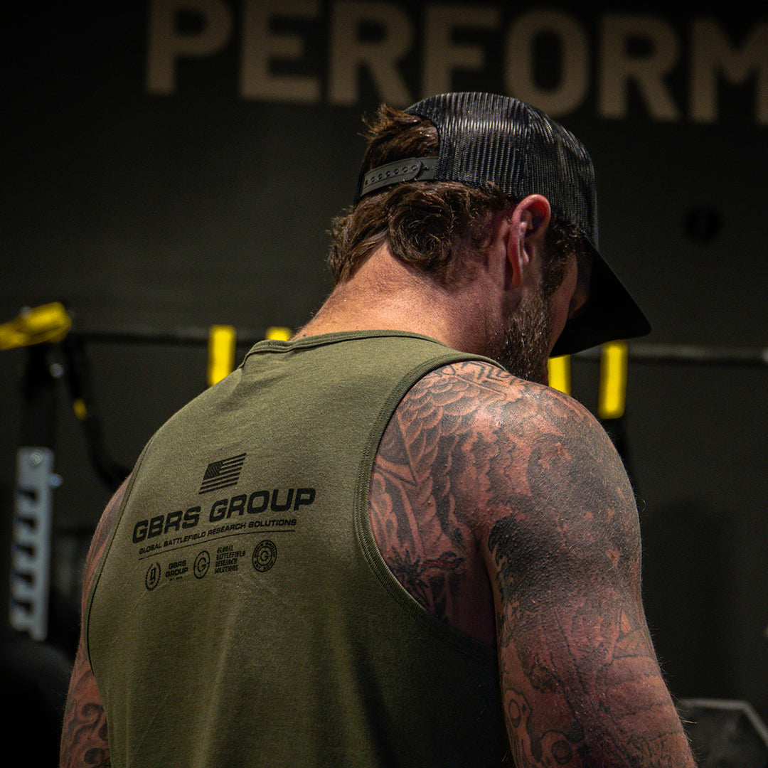 GBRS Group Instructor Tank - Anniversary Edition has a Slightly tapered athletic fit.
Pictured in Olive - Lifestyle at the gym