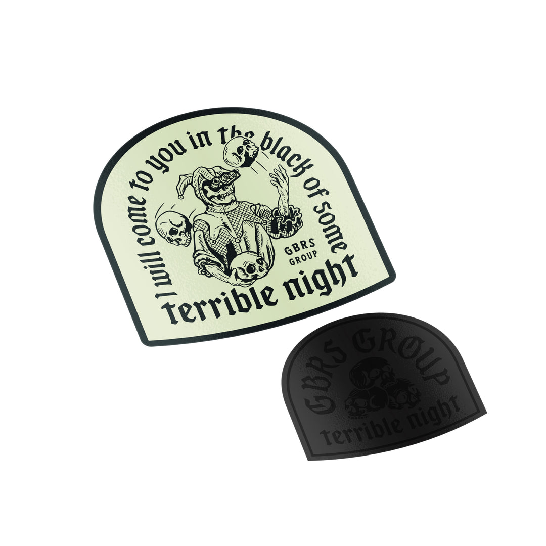 GBRS Group Terrible Night 2-Piece Sticker Pack. 100% Vinyl. 2.5" Black on Black raised print Terrible Night V3 graphic. 3" Glow in the dark Terrible Night V3 design