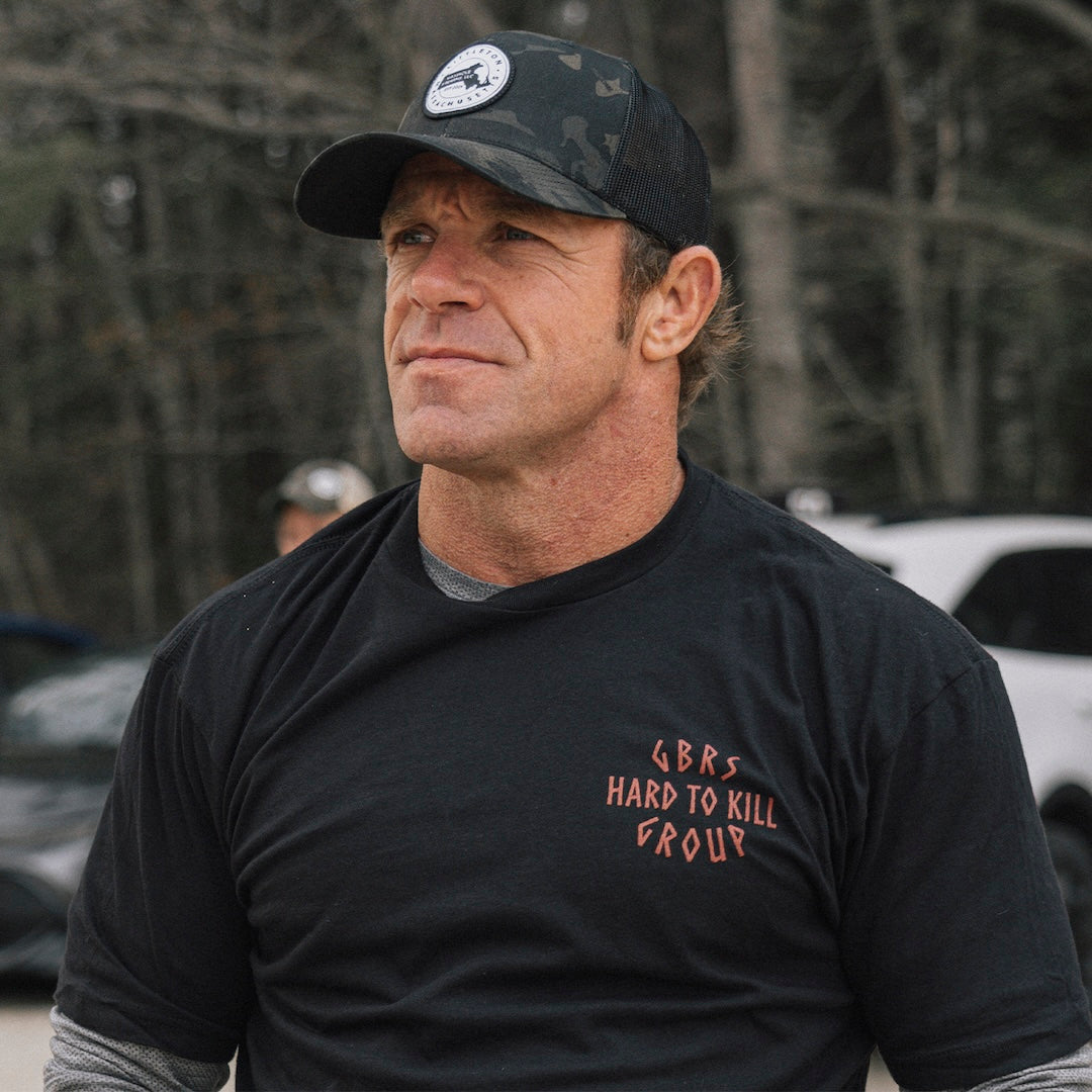 Model wearing the GBRS Group Hard to Kill Axe and Talon Short Sleeve in an outdoor environment 