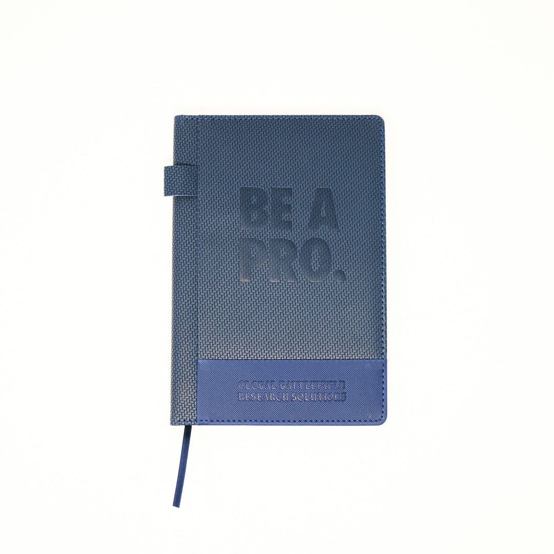 The Textured Be A Pro Field Book is constructed of a dual-textured hardcover with a faux leatherette band and features a pen loop on the spine, 80GSM Ivory ruled paper with date field, 96 sheets (192 pages) and ribbon bookmark.