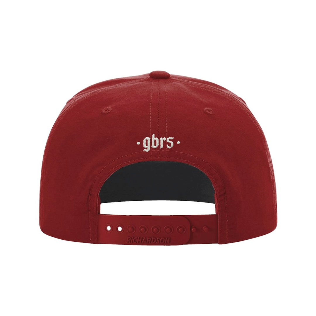 Back view of GBRS Group red rope hat with 'gbrs' text embroidered in white in the center against a white background.