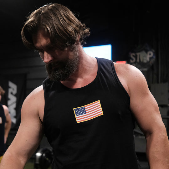 GBRS Group Patriotism Front & Center Tank - Screen printed center chest American Flag design - Lifestyle in a gym