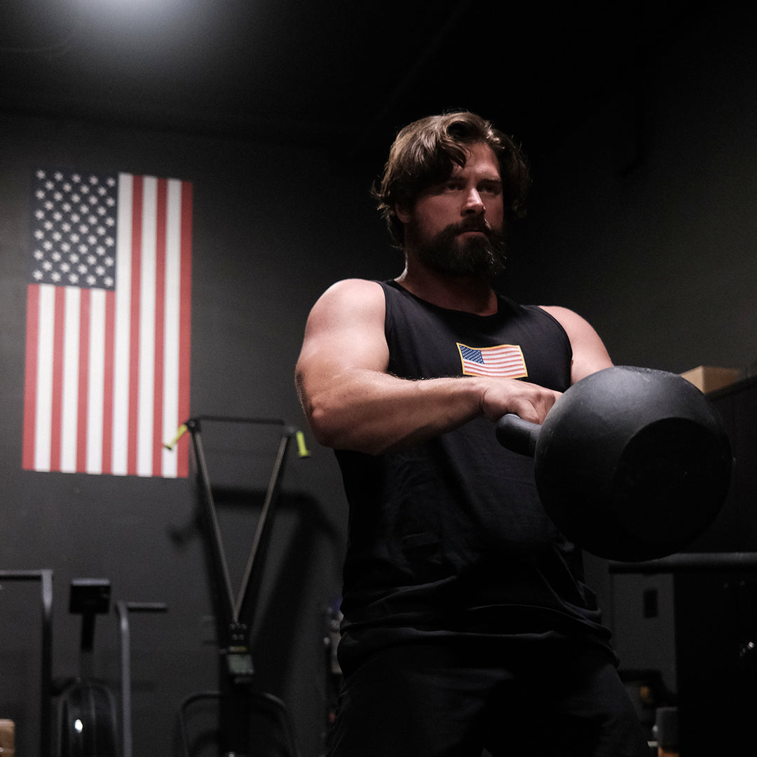 GBRS Group Patriotism Front & Center Tank - Screen printed center chest American Flag design - Lifestyle in a gym