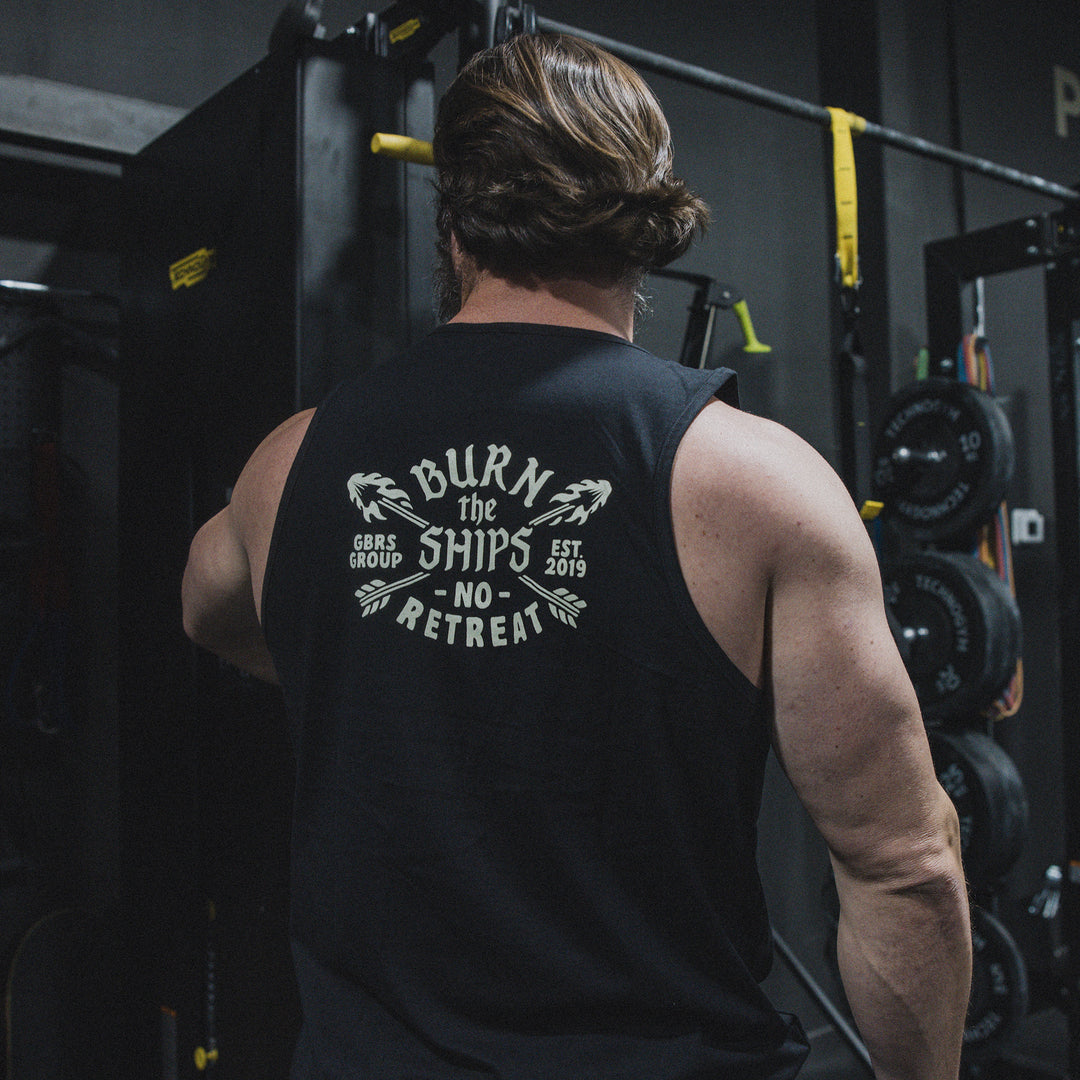 GBRS Group No Retreat Tank lifestyle image showing back of tank in a gym environment