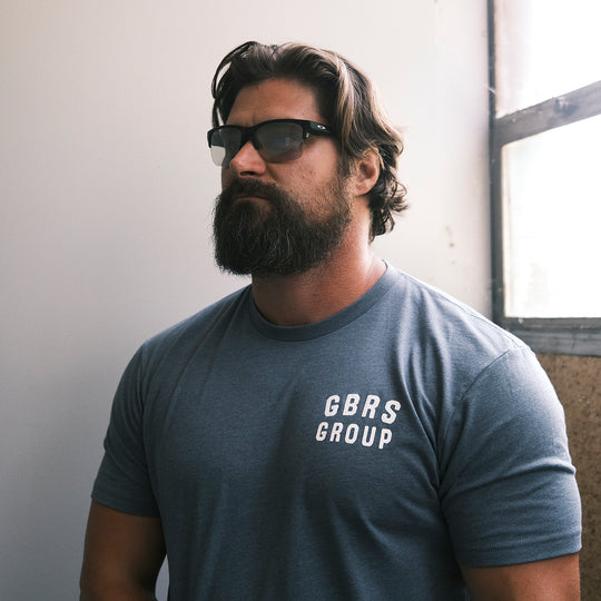GBRS Group Patriotism Isn't Dead Short Sleeve Shirt  - Screen printed left chest GBRS Group stacked design- Lifestyle on body image of front of shirt.