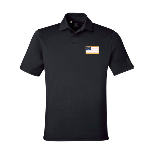 GBRS Group Patriotism Polo Shirt - Left chest American Flag rubberized thermal graphic. Embroidered GBRS "g" logo on the left sleeve. Pictured front of black polo on a white background. 