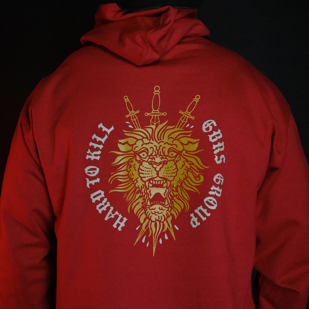 GBRS Group Triple Daggers Pullover Hoodie - Back of Cardinal colored hoodie on body in dark room