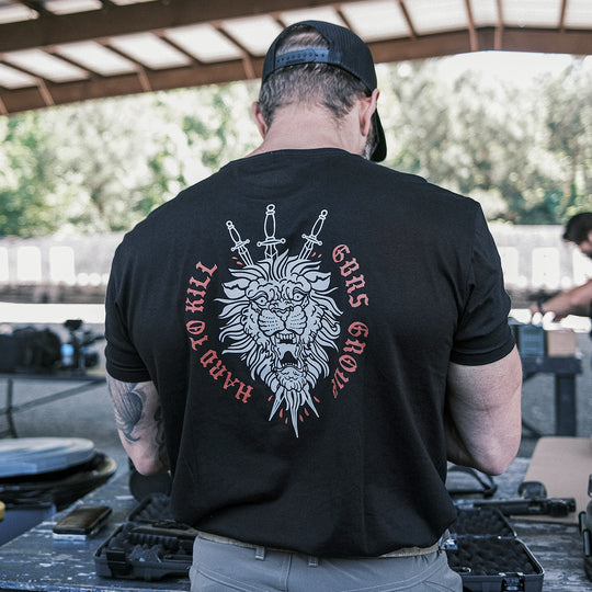 GBRS Group Triple Daggers Short Sleeve Shirt - Back of shirt on man's body at a range