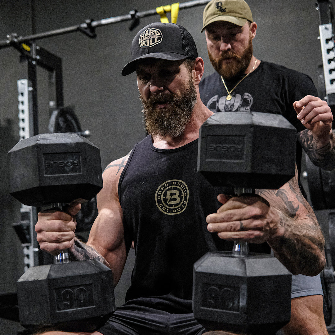 GBRS Group x BUM Energy Collab Grip Matters Tank - Front of Tank with Collab logo Design in gym lifestyle setting