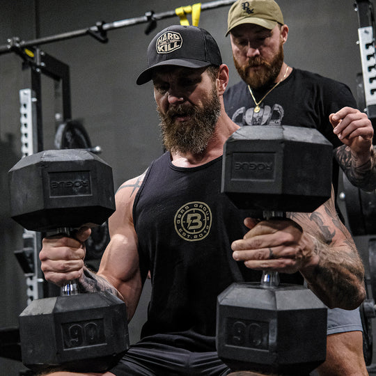 GBRS Group x BUM Energy Collab Grip Matters Tank - Front of Tank with Collab logo Design in gym lifestyle setting