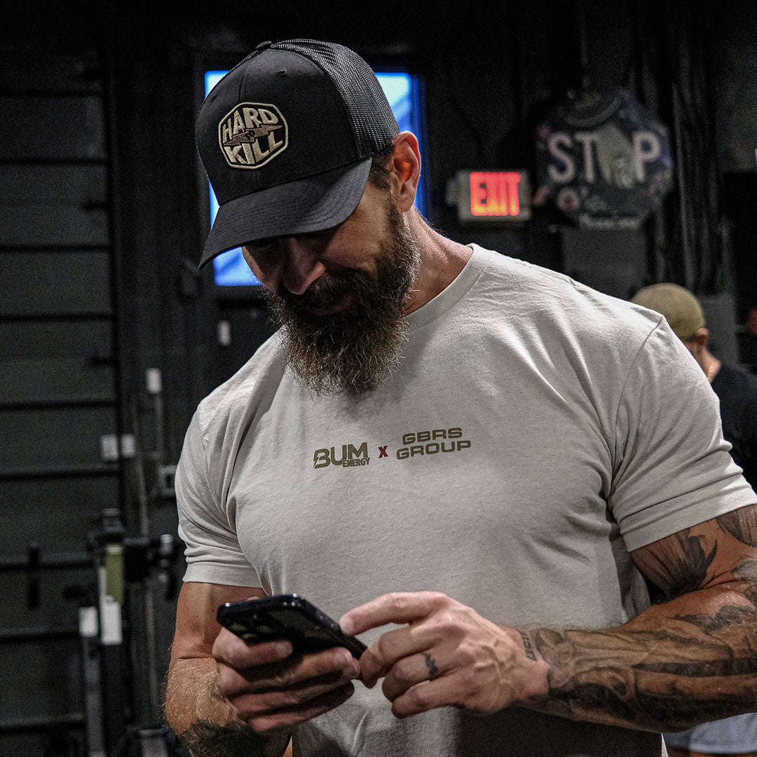 GBRS Group x BUM Energy Collab Hard To Kill Short Sleeve Shirt - Front of shirt on man in a gym - lifestyle