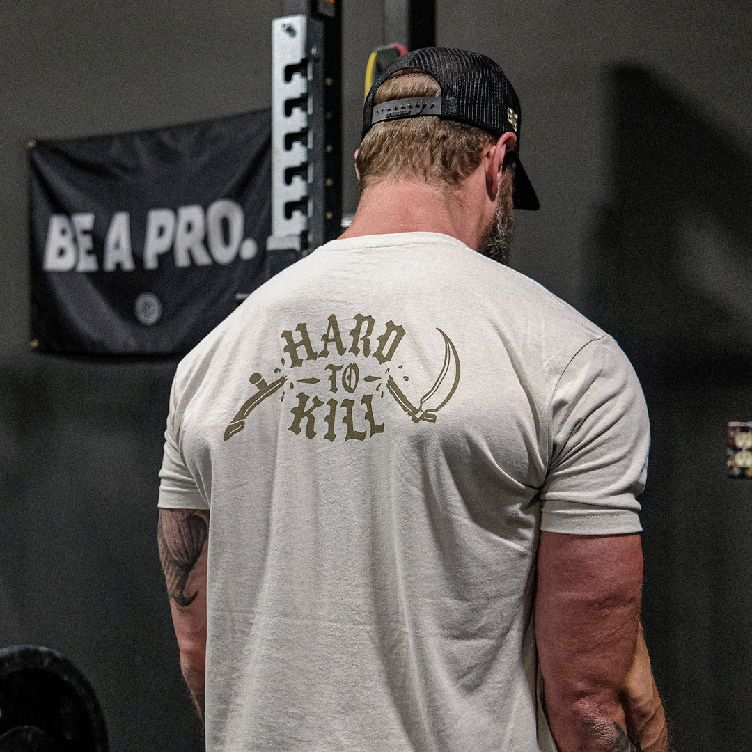 GBRS Group x BUM Energy Collab Hard To Kill Short Sleeve Shirt - Back of shirt on man in a gym - lifestyle