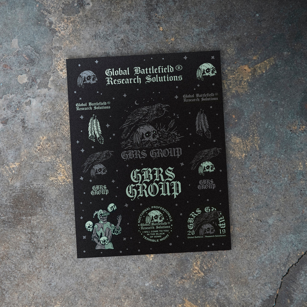 GBRS Group Terrible Night Sticker Sheet laid on a marble table 