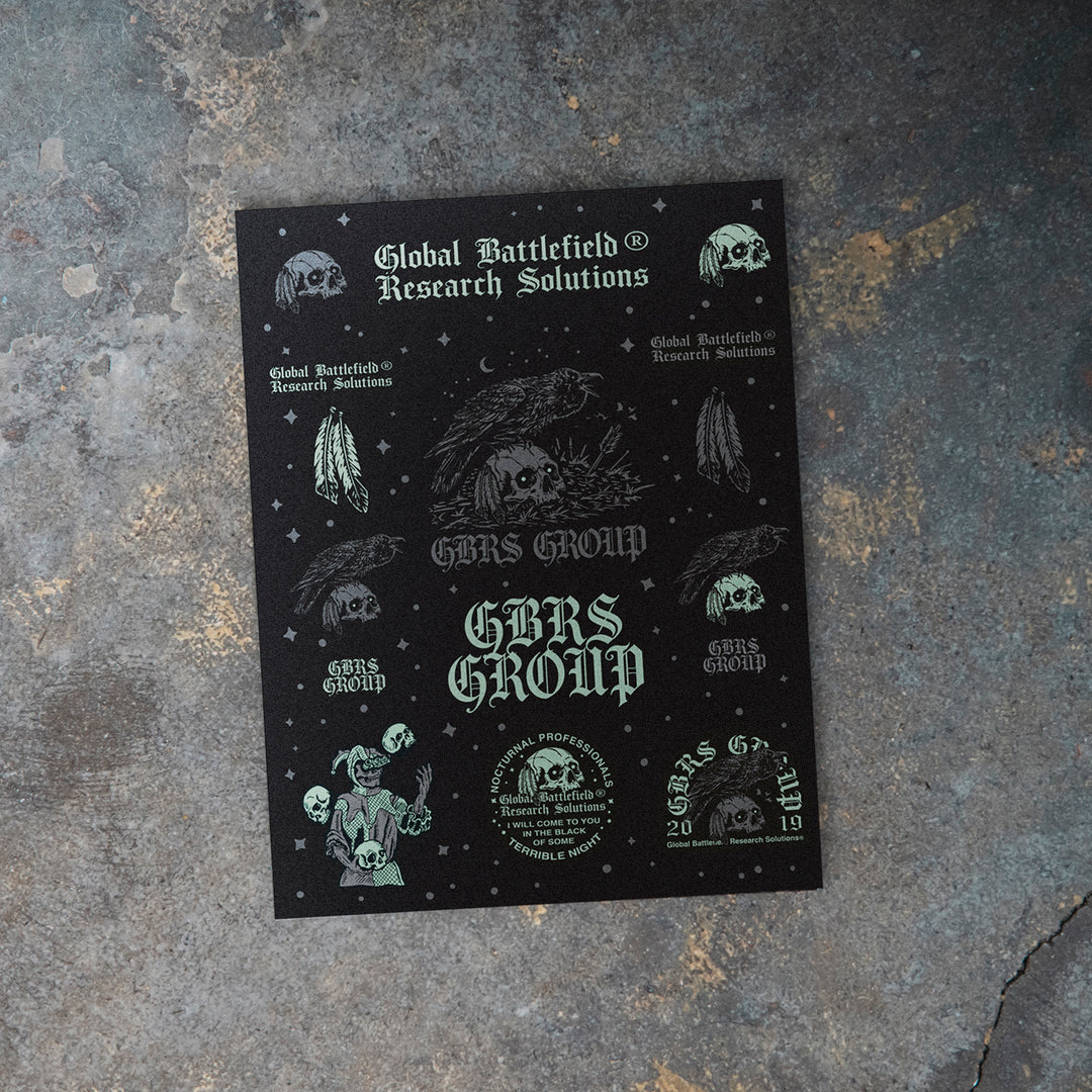 GBRS Group Terrible Night Sticker Sheet laid on a marble table 