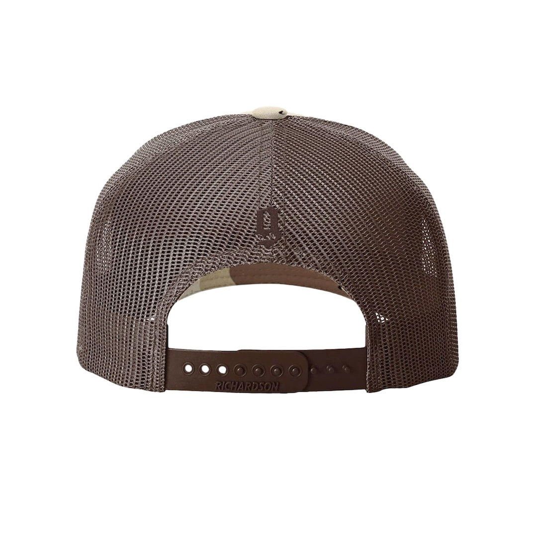 Back view of premium camouflage trucker hat featuring a small embroidered 'g' on the mesh backing, on a white background.