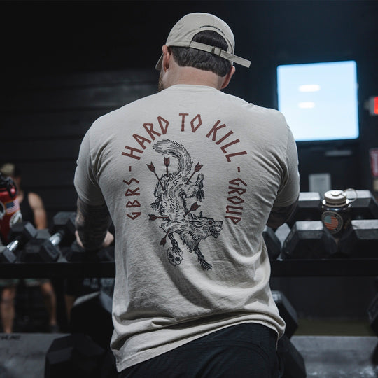 Model wearing the GBRS Group Hard to Kill Death Grip Short Sleeve in a gym environment 
