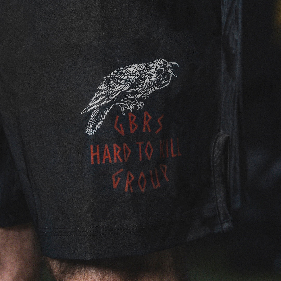 Close up of GBRS Group Hard to Kill Fight Shorts design on the front lower left of shorts
