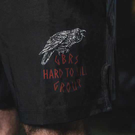 Close up of GBRS Group Hard to Kill Fight Shorts design on the front lower left of shorts