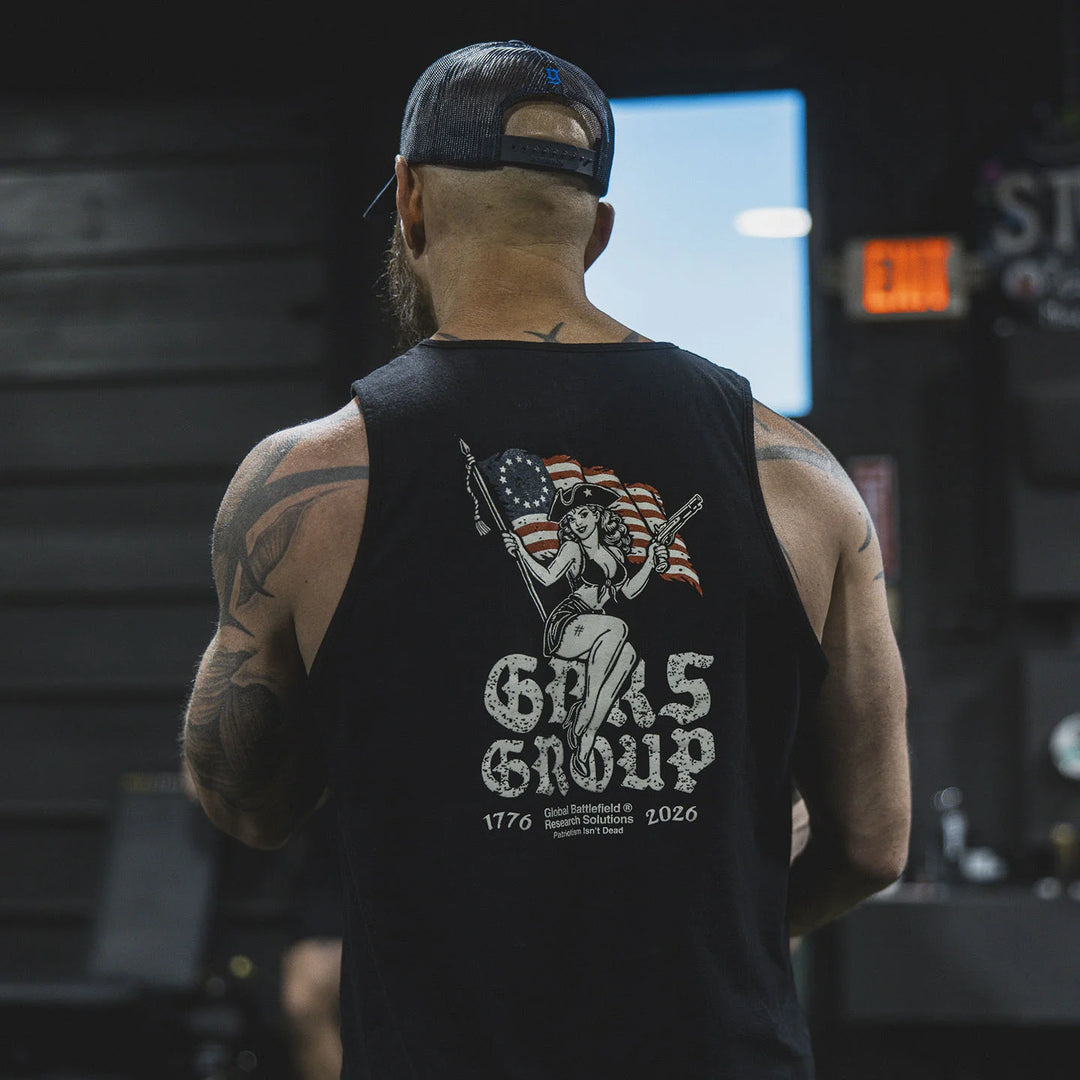 Person wearing the GBRS Group Lead and Lace Tank, standing in a gym.