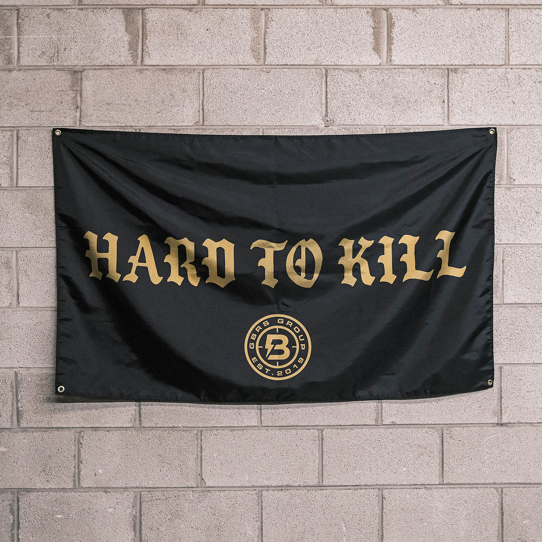 GBRS Group x Bum Energy Collab Hard To Kill Flag-On Brick Wall