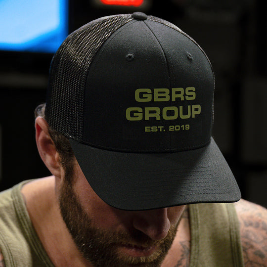 GBRS Group Instructor Trucker Hat - Anniversary Edition with Front centered rubberized thermal graphic GBRS Group graphic - Lifestyle picture