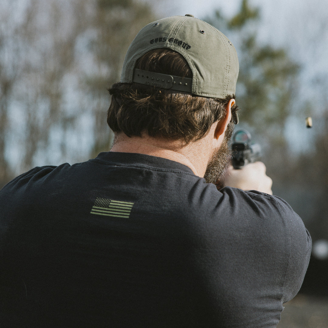 GBRS Group Instructor Long Sleeve Shirt - Lifestyle photo showing the back of the shirt in Black