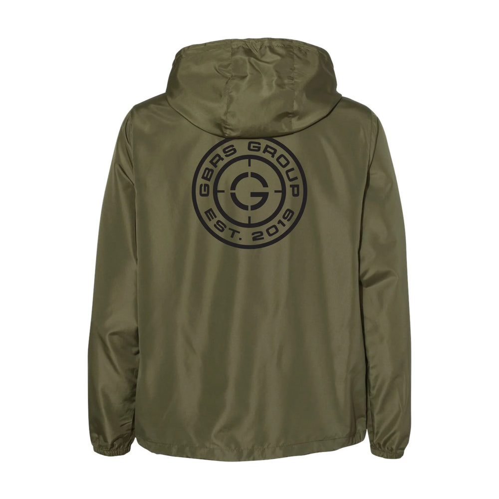 Back view of green windbreaker jacket with a logo on the back against a white background