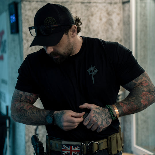 GBRS Group No Quarter Short Sleeve Shirt - Lifestyle shot at a range showing the grey front left chest design